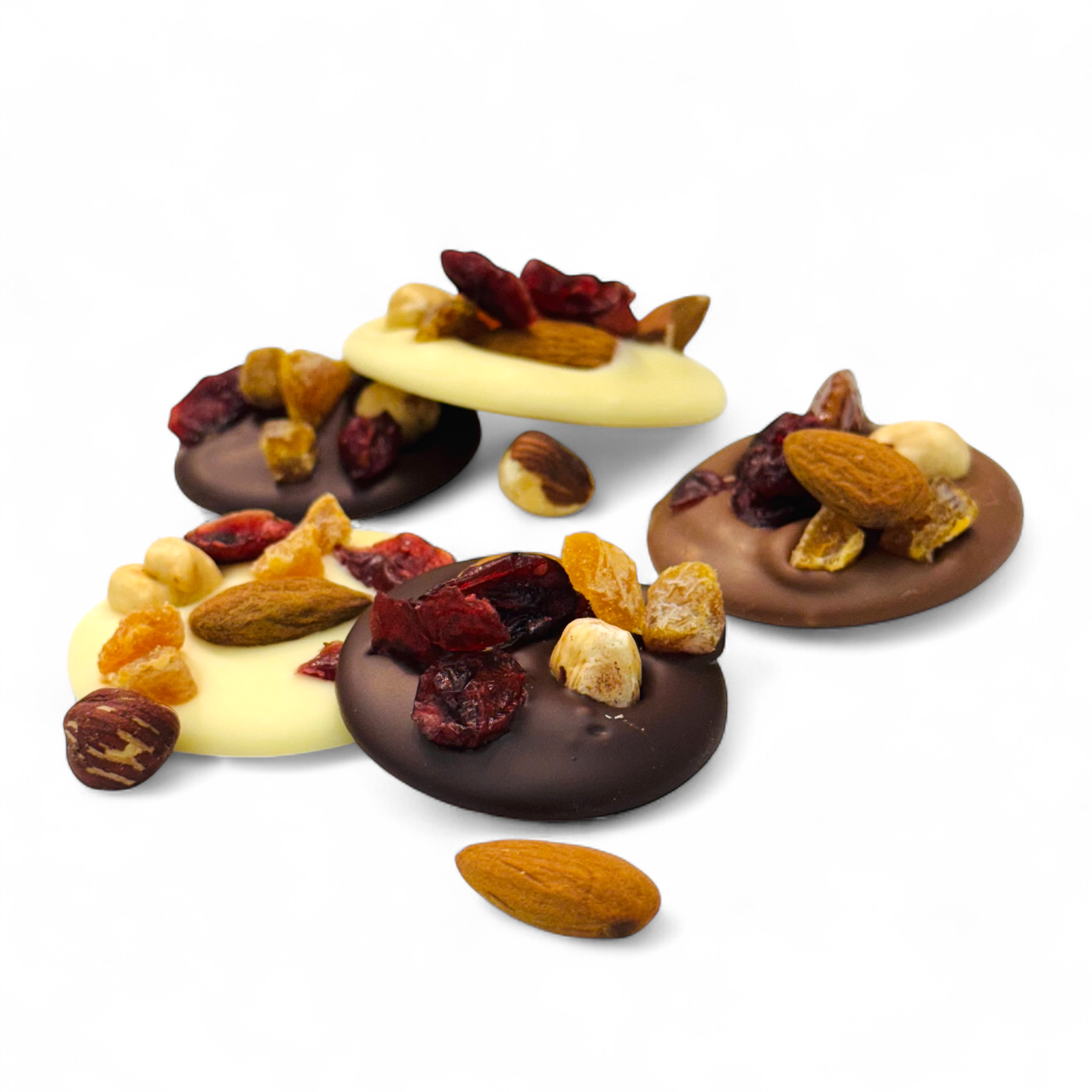 Handmade Fruit & Nut Chocolate Discs, also known as mendiants. Bag of 6 Belgian milk, dark or white chocolates topped with almonds, hazelnuts, apricots & cranberries.