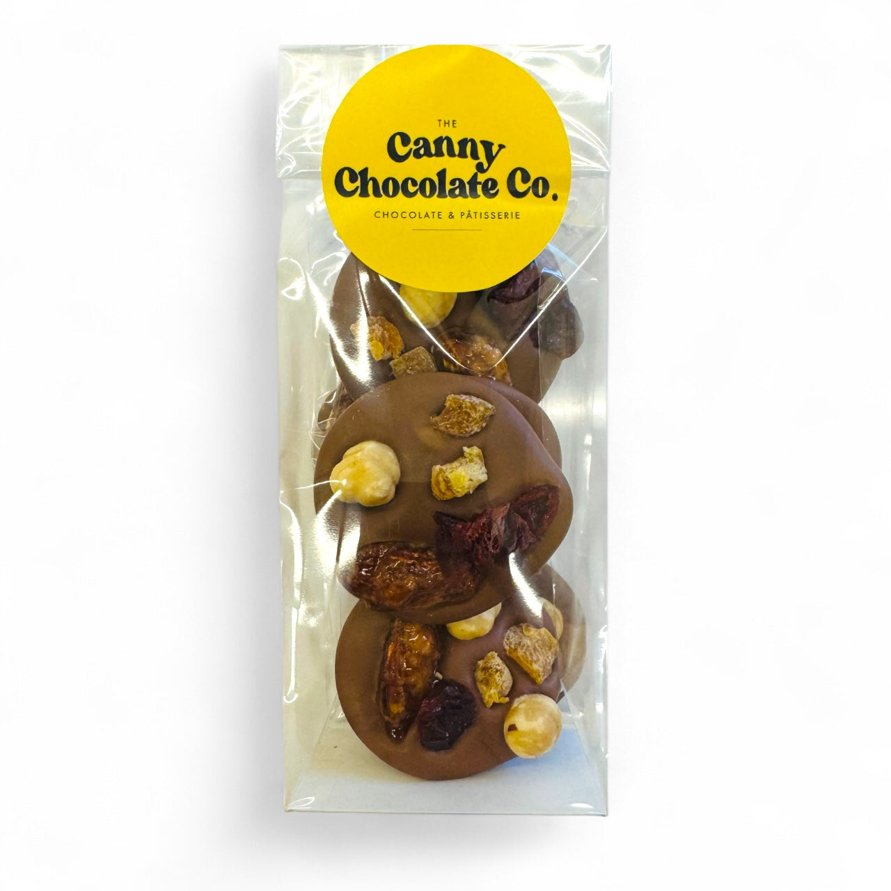 Handmade Fruit & Nut Chocolate Discs, also known as mendiants. Bag of 6 Belgian milk, dark or white chocolates topped with almonds, hazelnuts, apricots & cranberries.